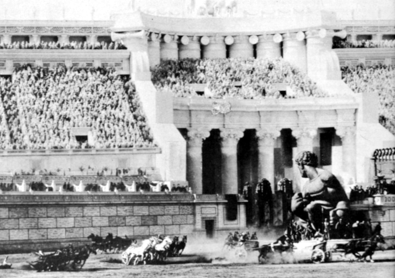 The chariot race from "Ben-Hur" (1926). Scenes were shot on a partial set in Culver City, with a hanging miniature filling in the top portion of the frame.