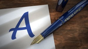 Fountain pen resting on piece of paper with the capital letter "A"